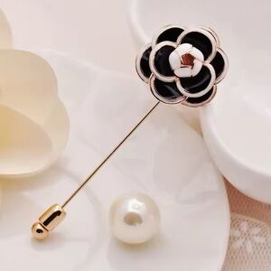 Camilla black flower with gold and black accents brooch pin with pearl